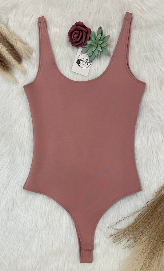 Smooth mauve body suit